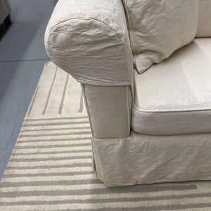 White Love Seat with Slip Covers