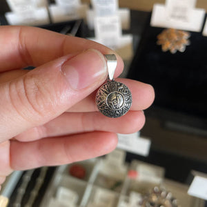 Silver llama Aztec Calendar Pendant from Peru
